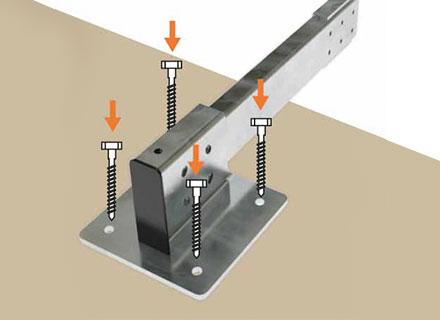 anclaje elevador fijado con tornillos al pavimento